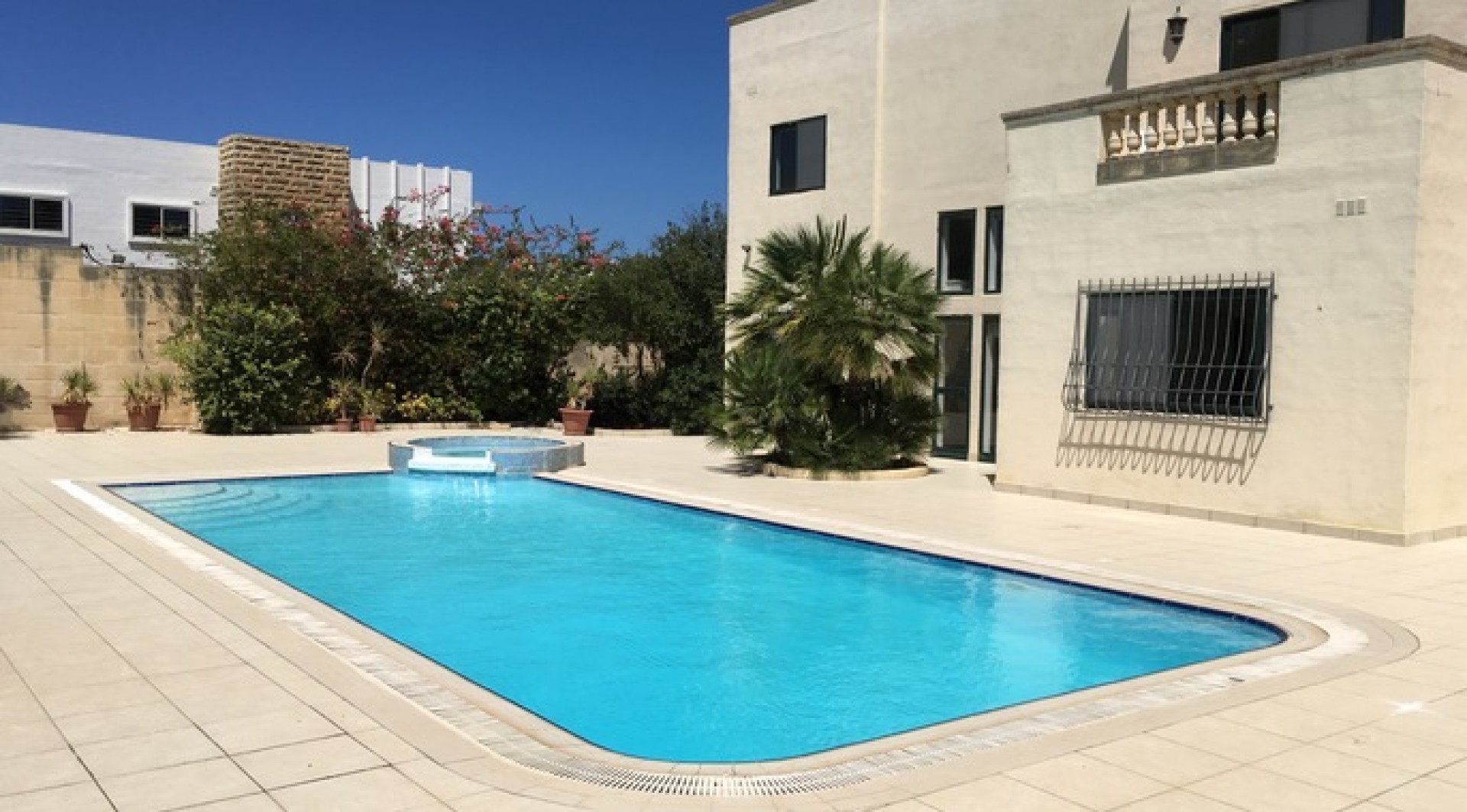 Villa with a Pool and Gardens