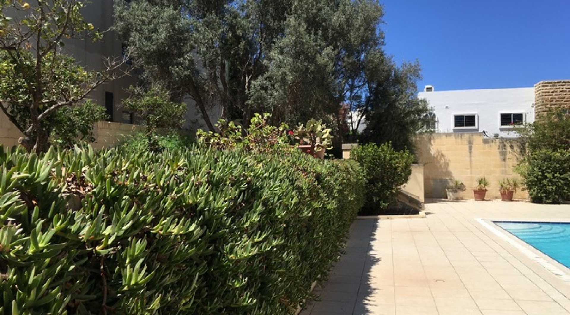 Villa with a Pool and Gardens