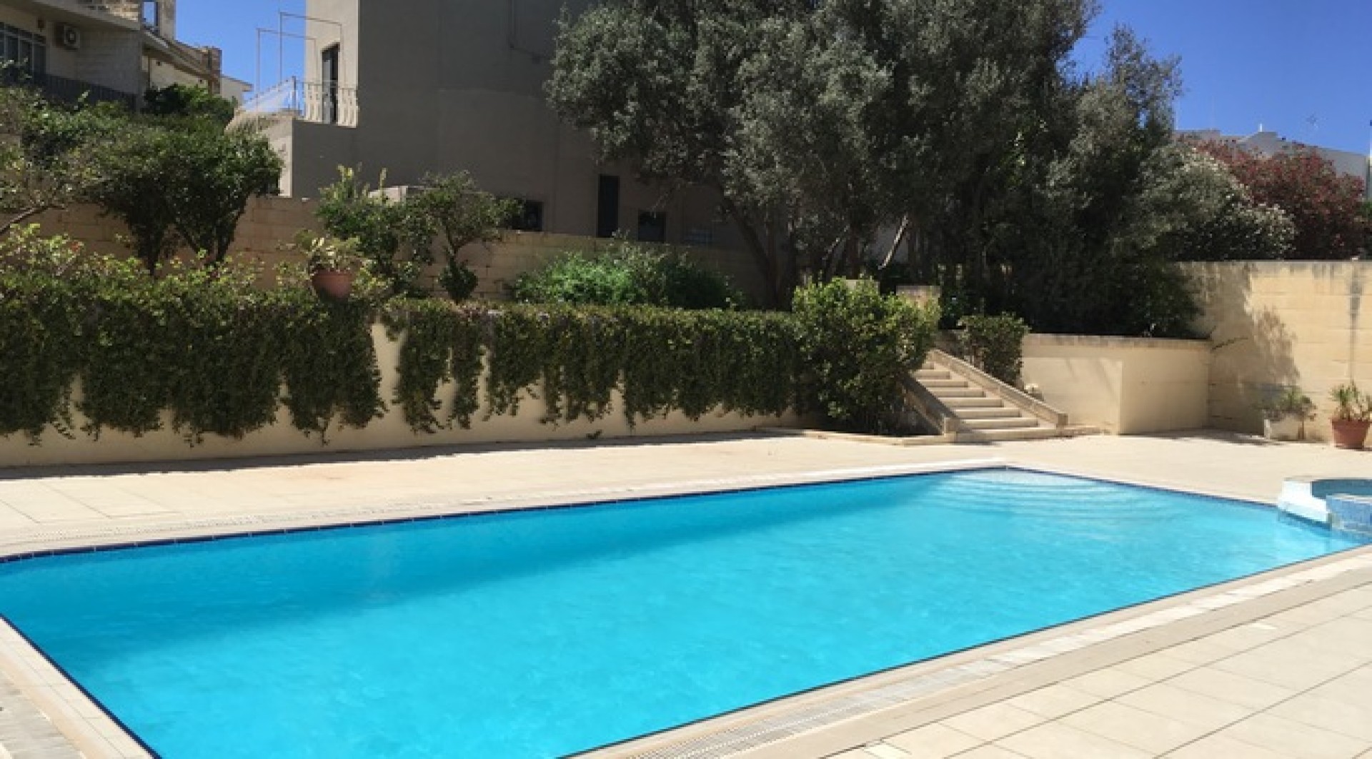 Villa with a Pool and Gardens