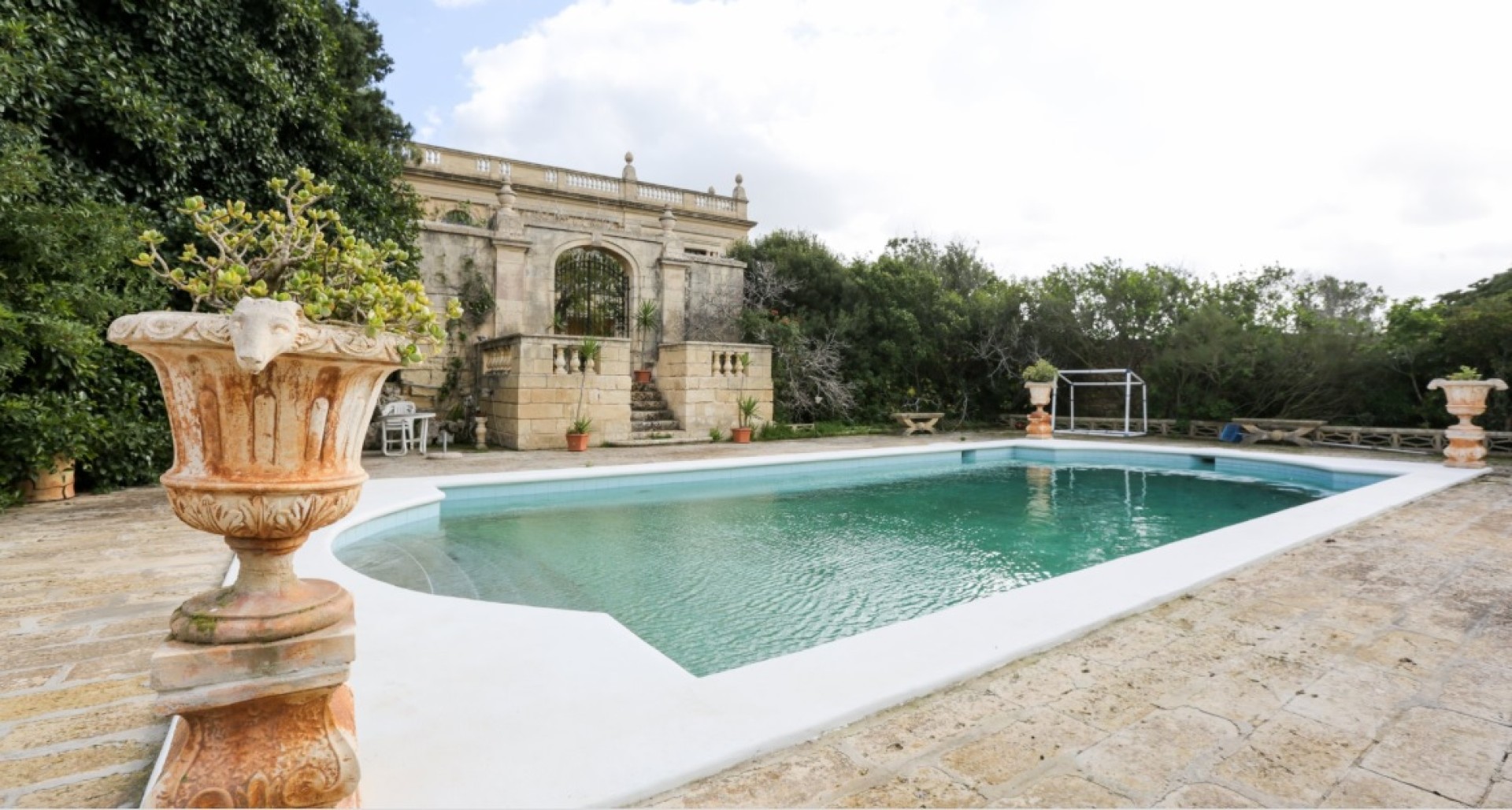 Palazzo with a Pool and Gardens