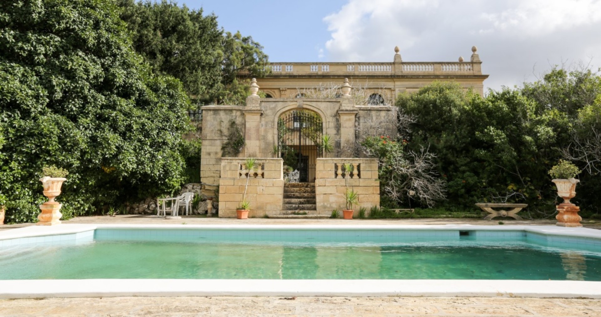 Palazzo with a Pool and Gardens