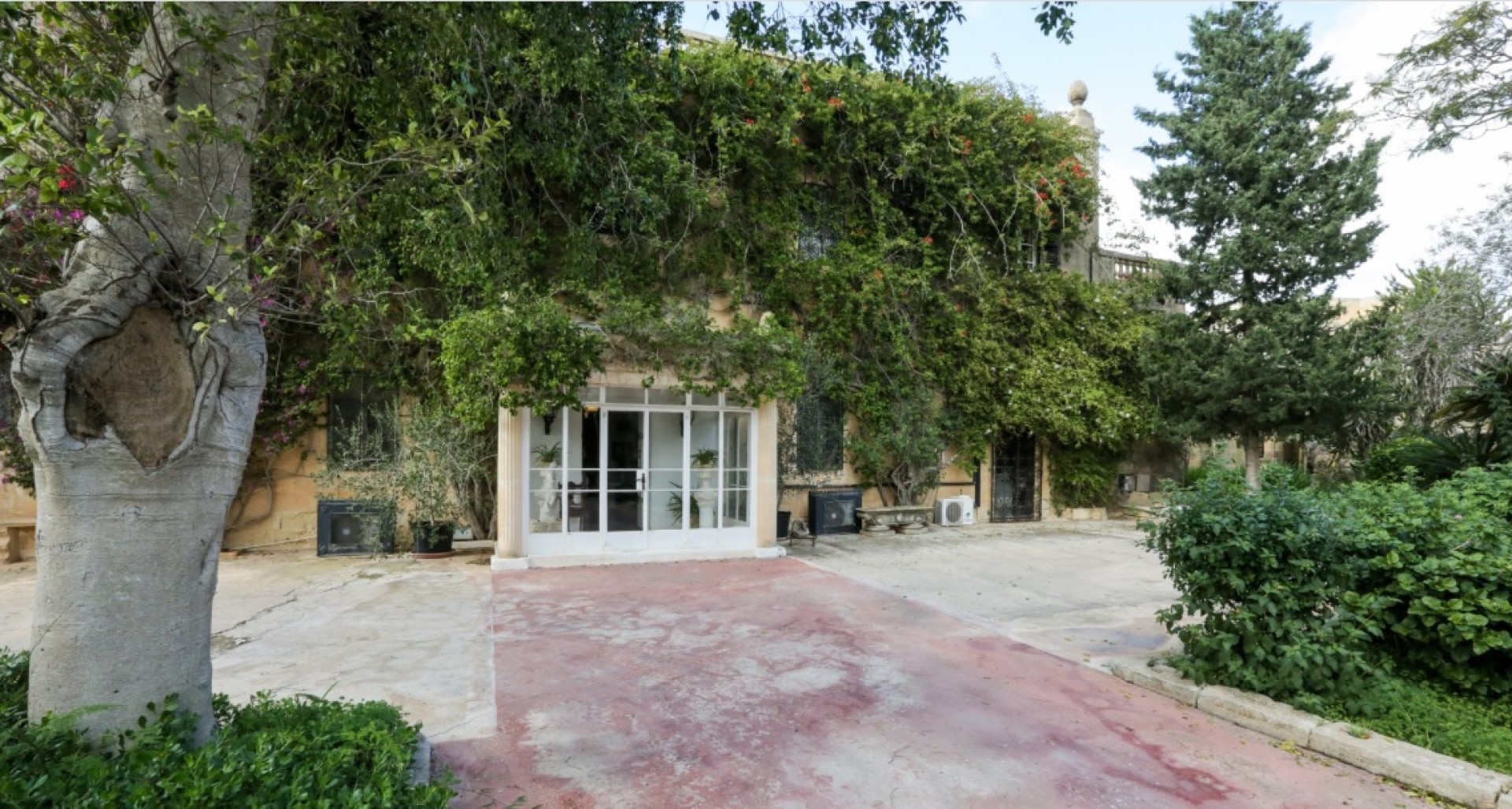 Palazzo with a Pool and Gardens