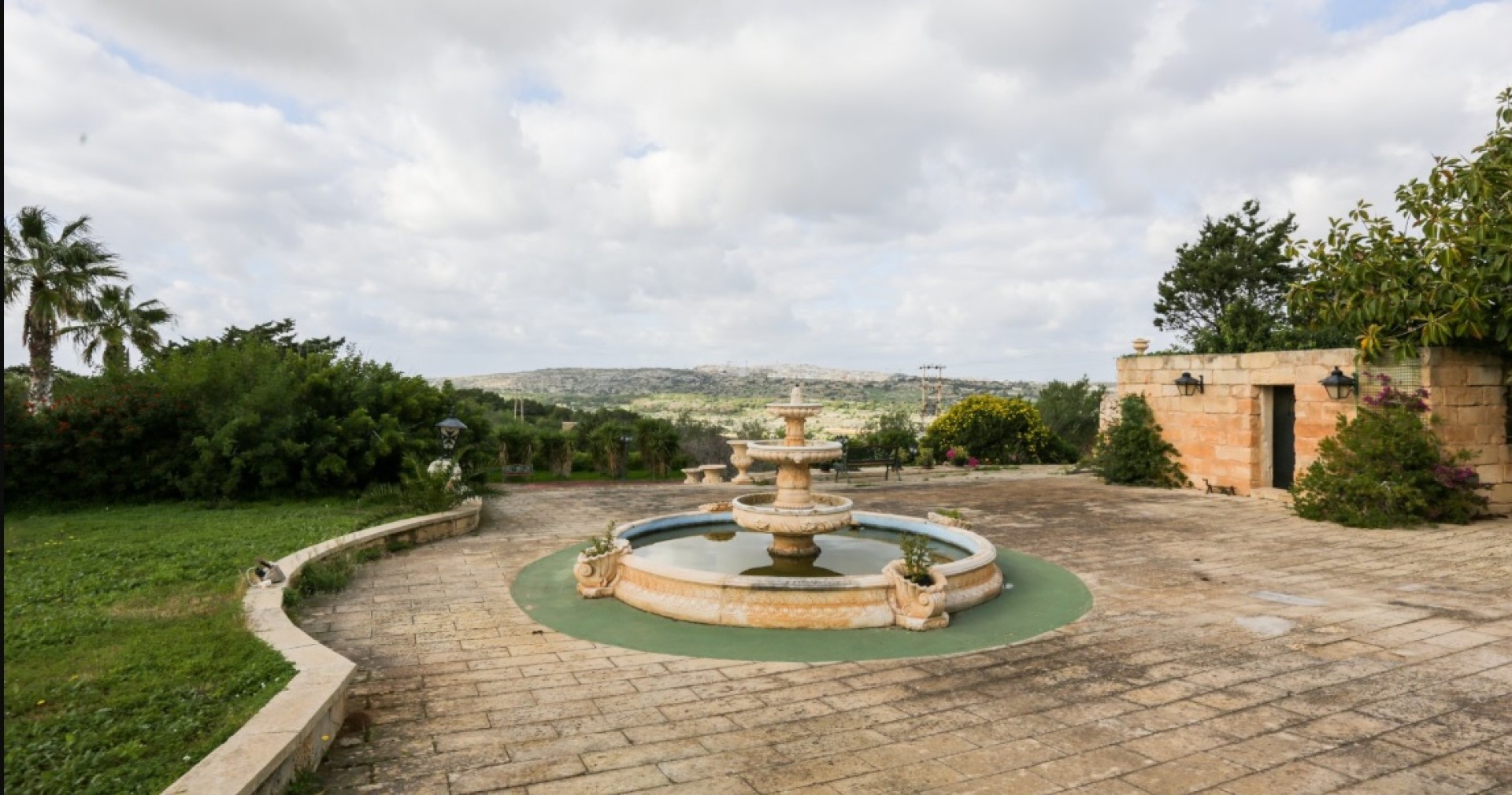 Palazzo with a Pool and Gardens