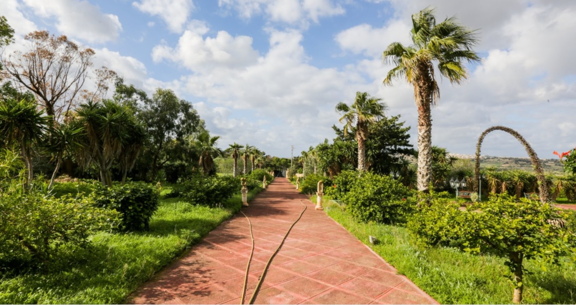 Palazzo with a Pool and Gardens