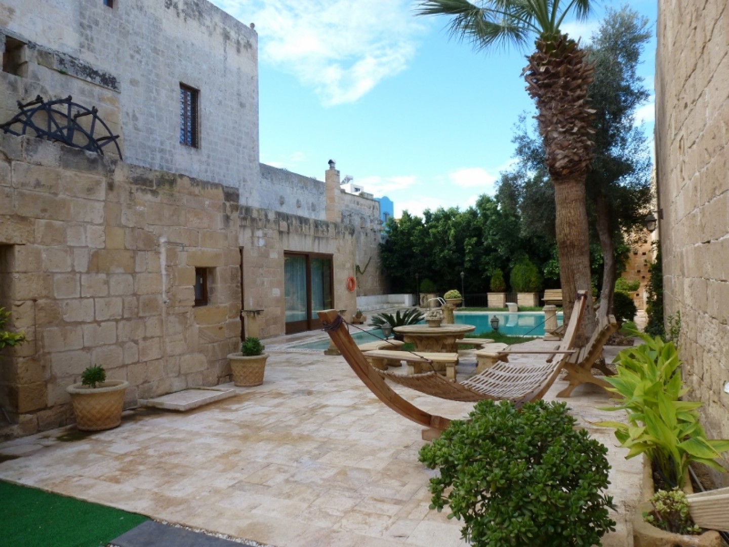 Palazzo with a Pool and Gardens