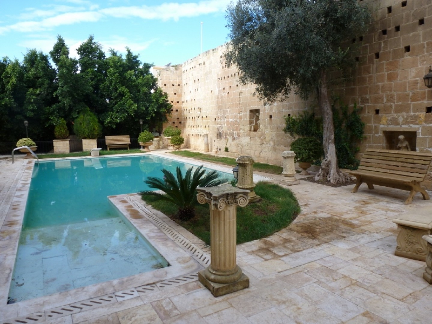 Palazzo with a Pool and Gardens