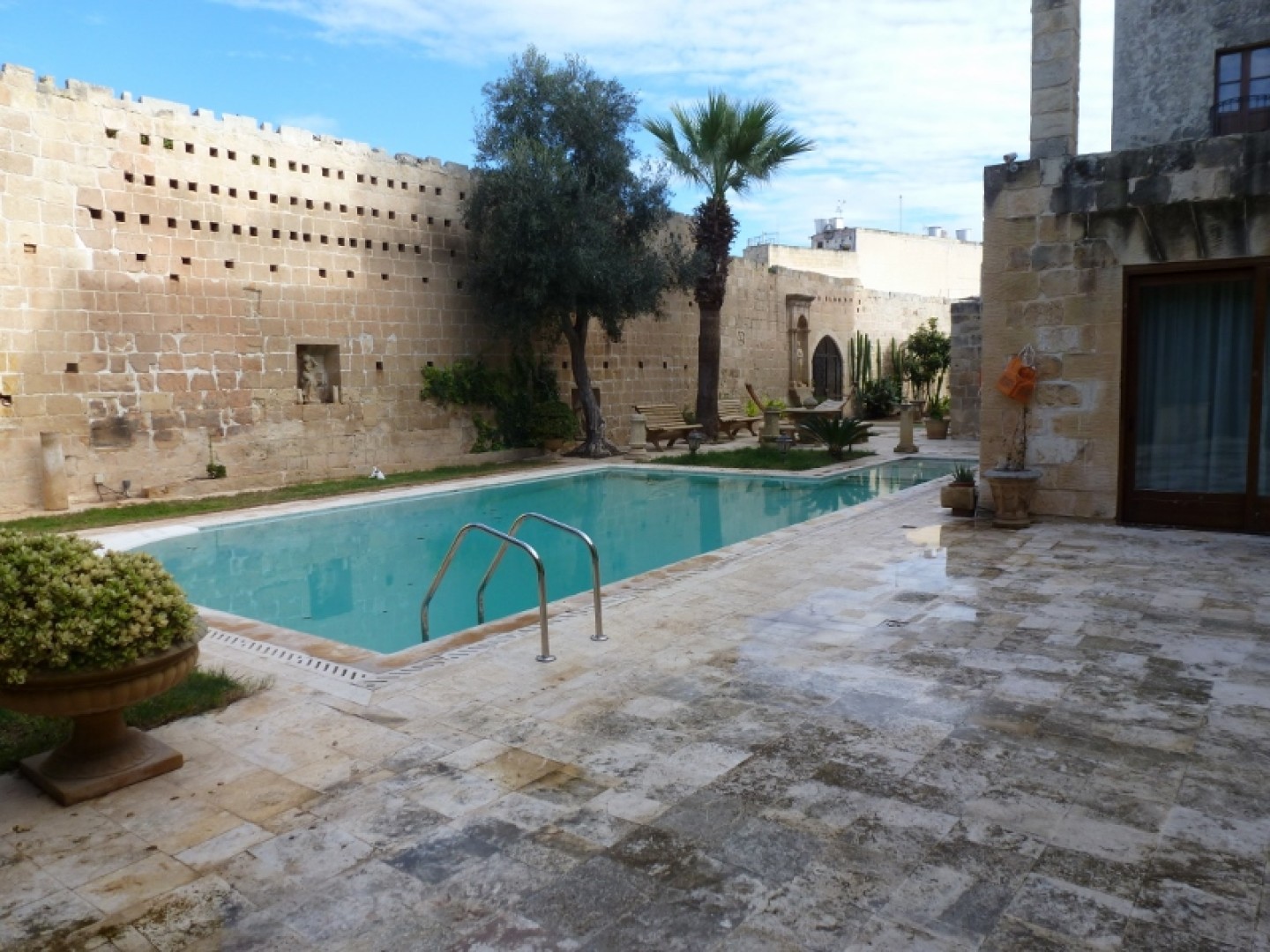 Palazzo with a Pool and Gardens