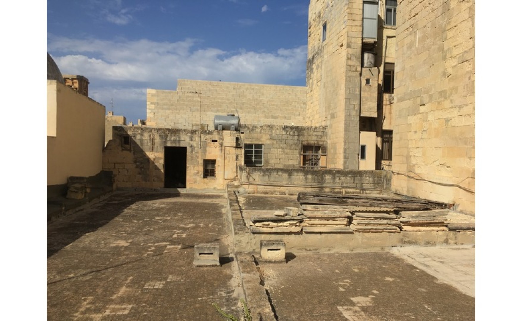 Block of Apartments with a Roof Terrace