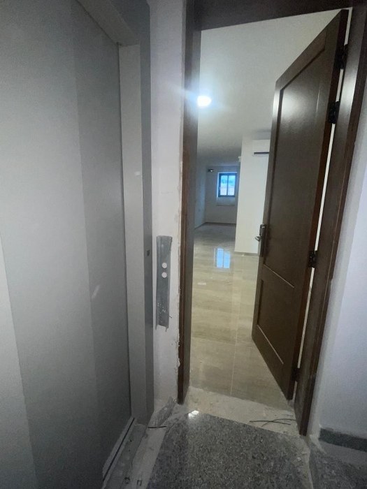 Block of Apartments with a Roof Terrace