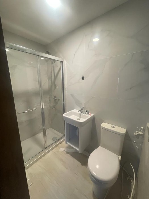 Block of Apartments with a Roof Terrace