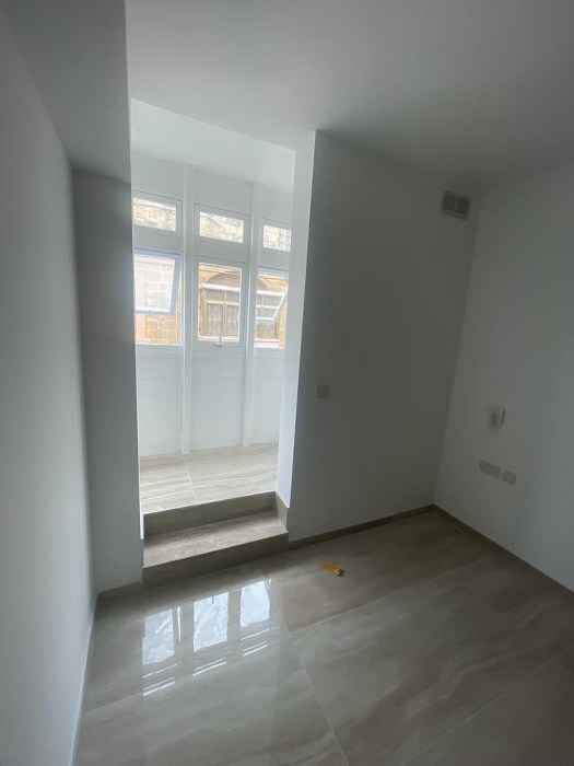 Block of Apartments with a Roof Terrace
