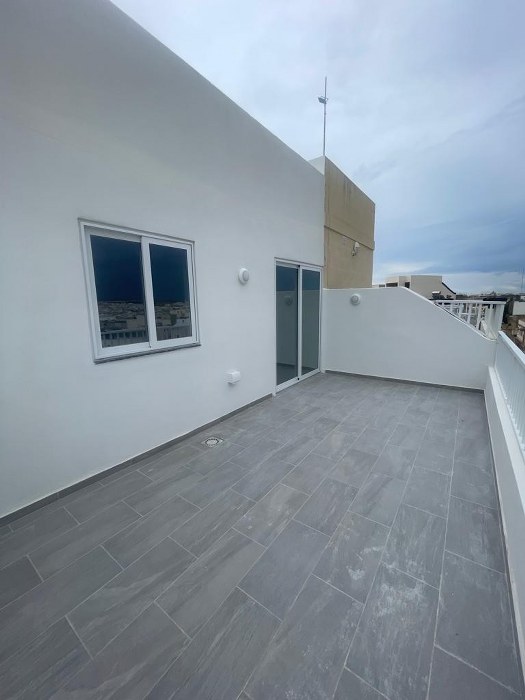 Block of Apartments with a Roof Terrace