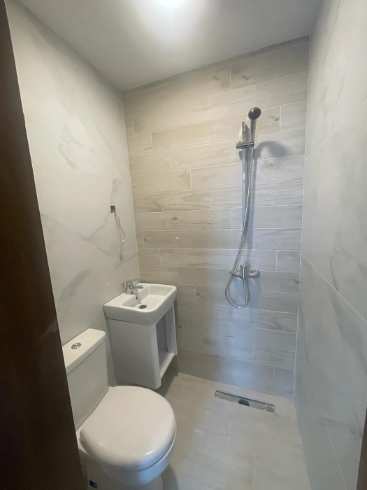 Block of Apartments with a Roof Terrace