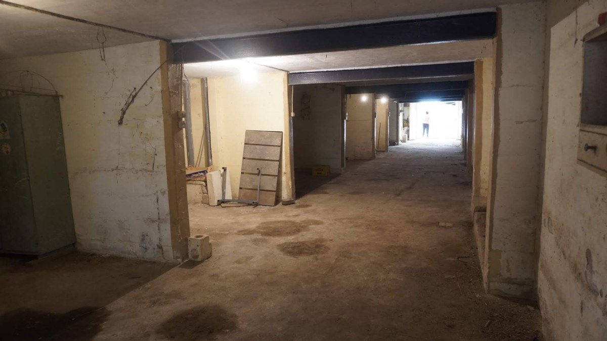 Investment Opportunity: Ground-Floor Garage with Yard in San Gwann!